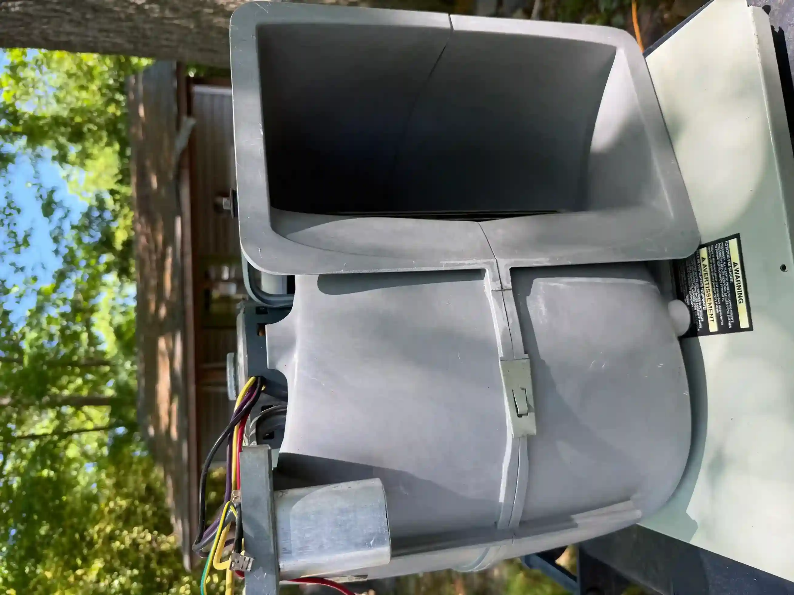 Cleaned and reassembled blower housing with neatly routed control wiring