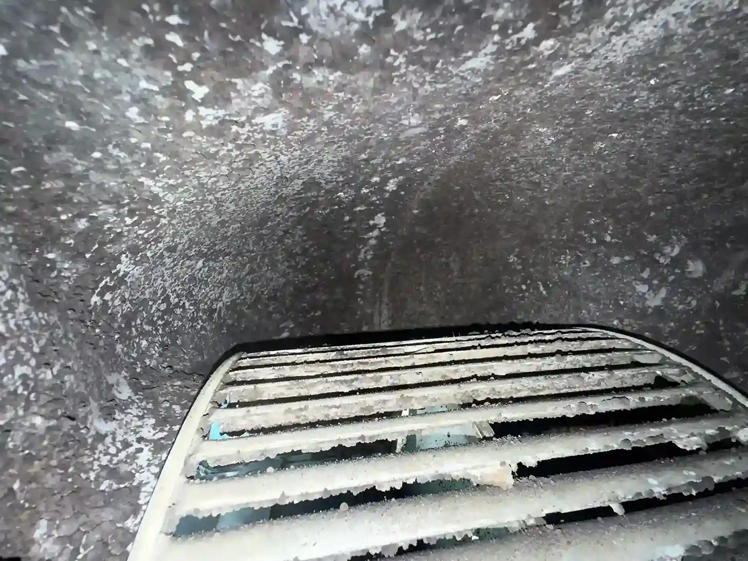 Heavy dust layering on duct interior surfaces with dirty vent register ahead